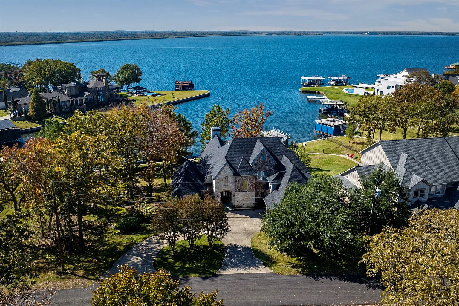 Aerial view of the property and shoreline